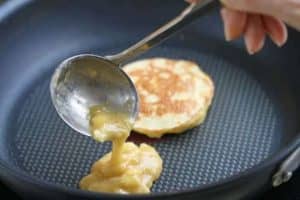 gluten-free Breakfast banana pancakes putting in the pan