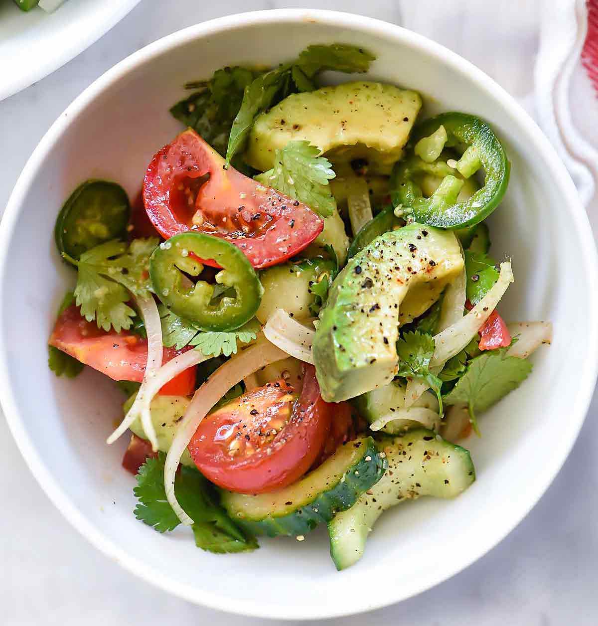Raw- Spicy Cucumber Avocado and Onion Salad